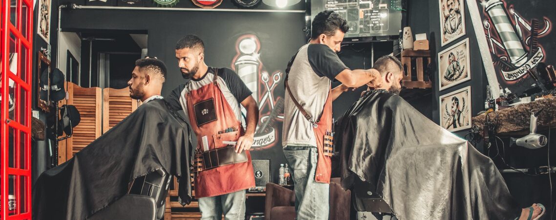 men having their haircut